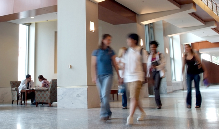 people in a campus building