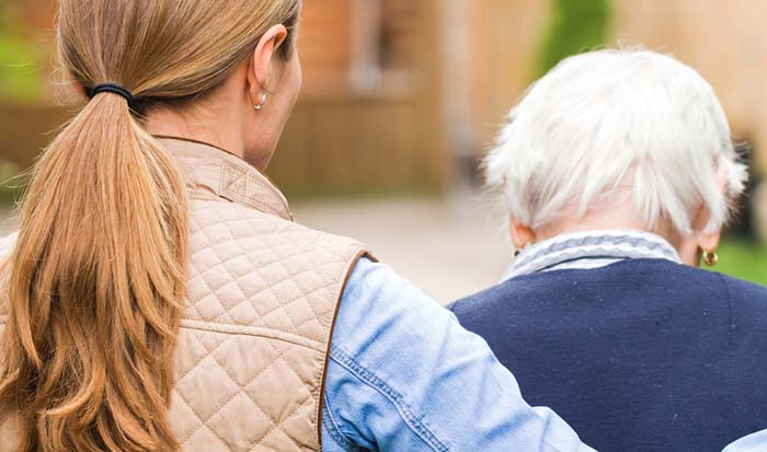 adult woman with elderly woman